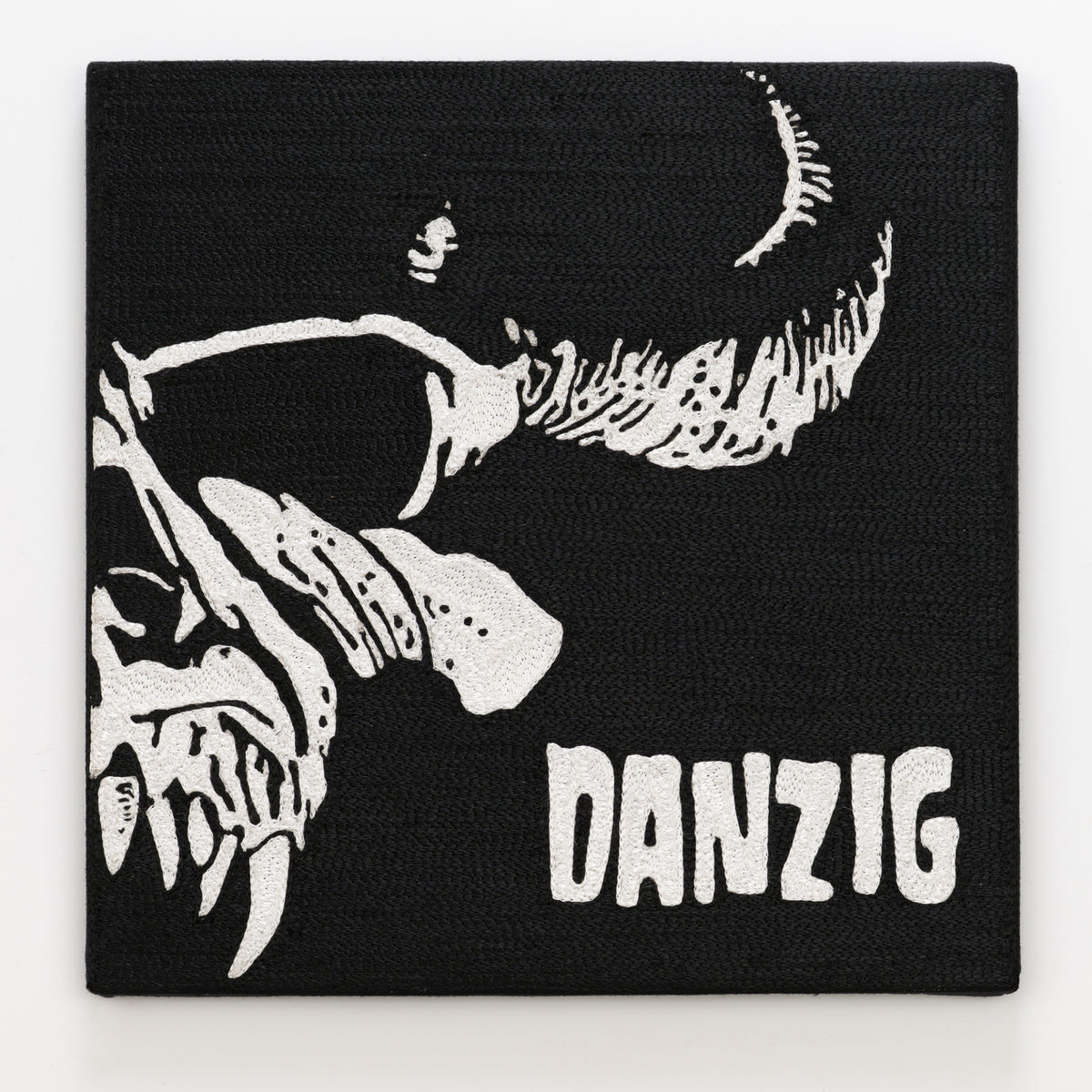 Shane Brown's panel reinterpreting Self Titled by Danzig, 12 by 12 inch plywood, from The LP Show 2026